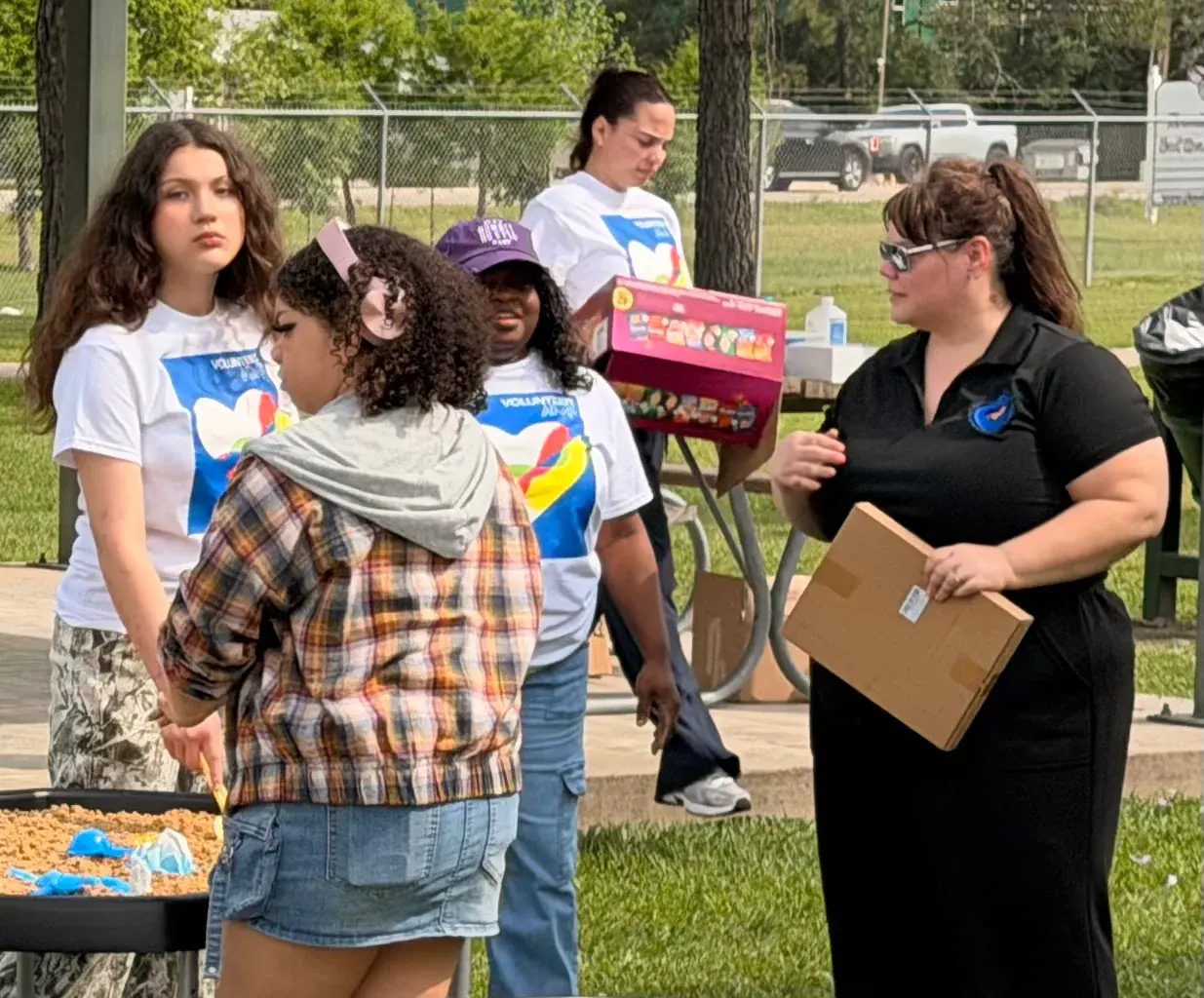 AMF participants gather around an outdoor activity.